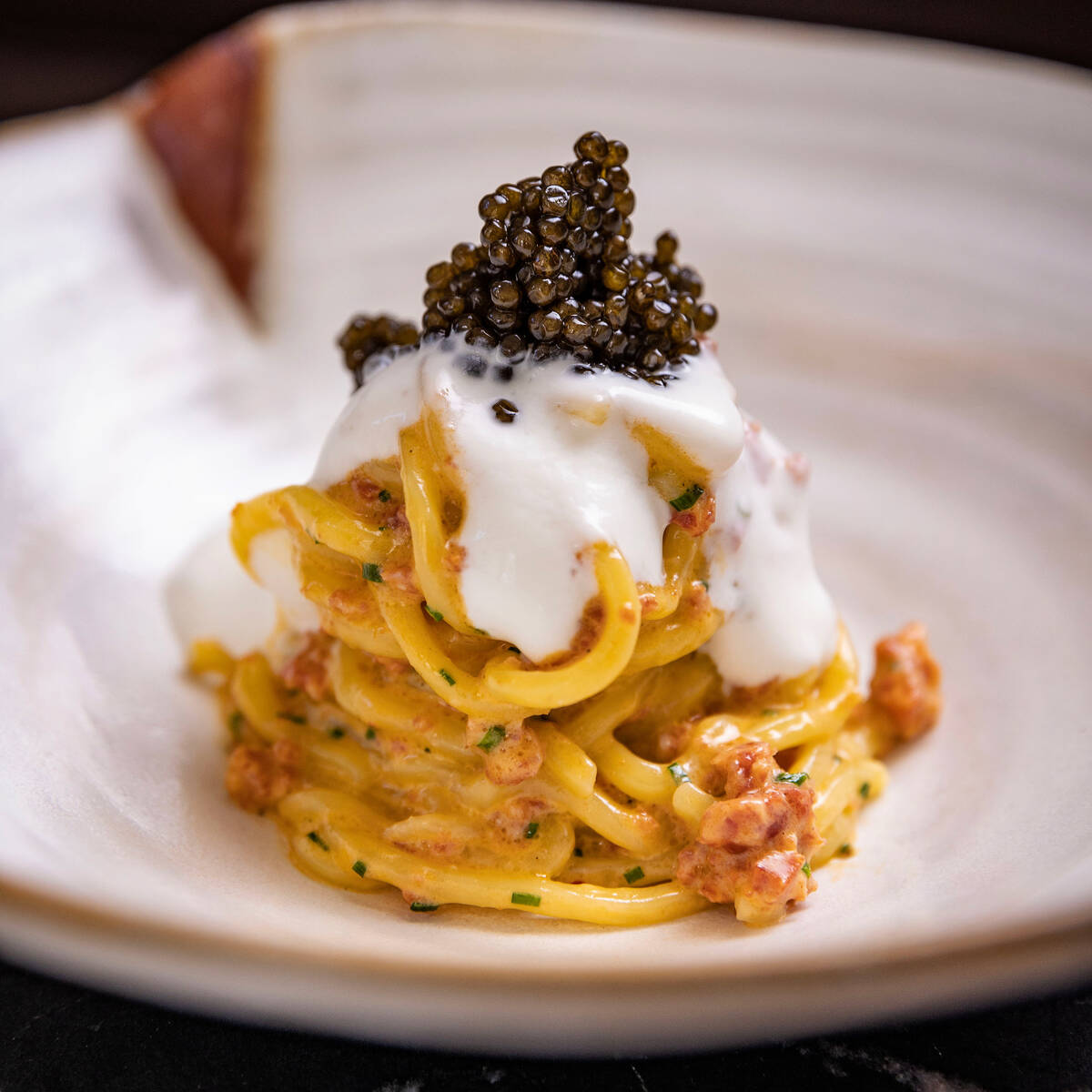 Mochi ramen caviar and pepperoni from PastaRamen, a pop-up running through July 12, 2025, at Ba ...