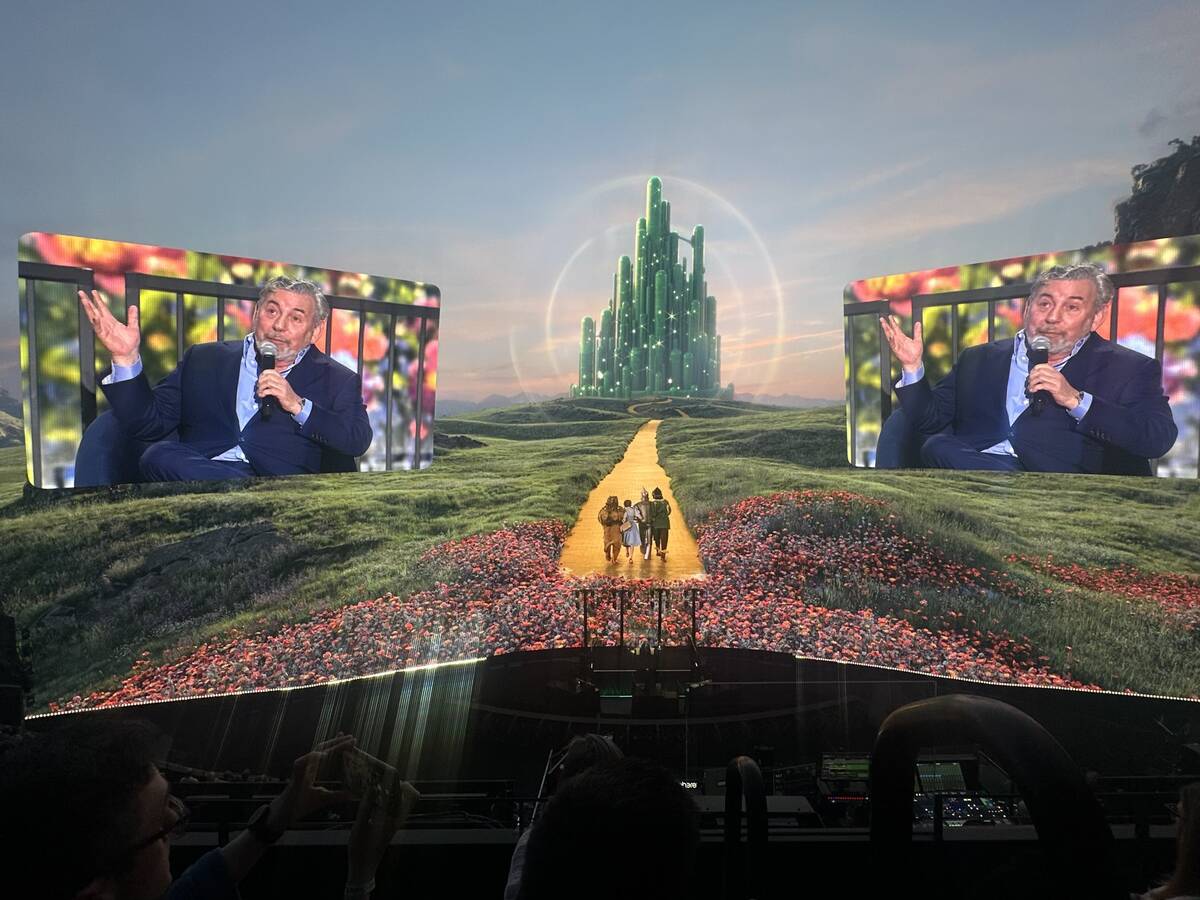 Sphere Entertainment Chairman and CEO James Dolan is shown over a scne from "The Wizard of Oz a ...