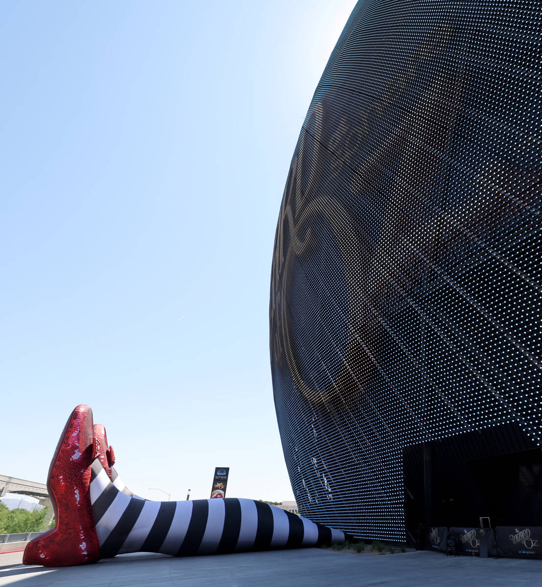 The Wicked Witch of the East legs and ruby slippers installation is seen to promote "The W ...