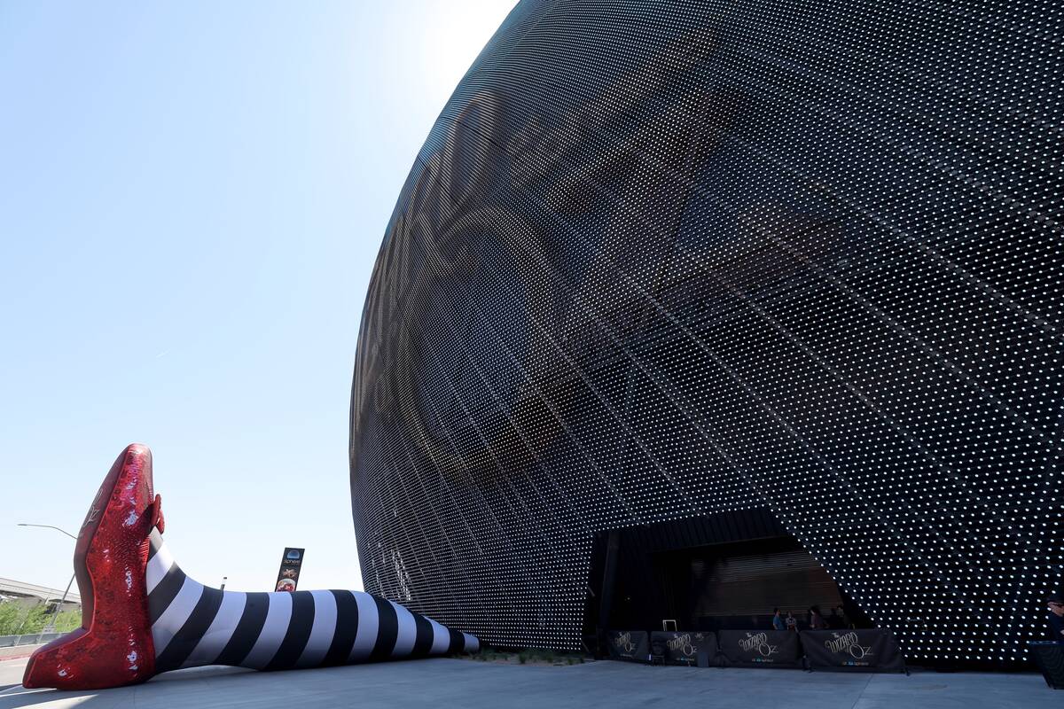 The Wicked Witch of the East legs and ruby slippers installation is seen to promote "The W ...
