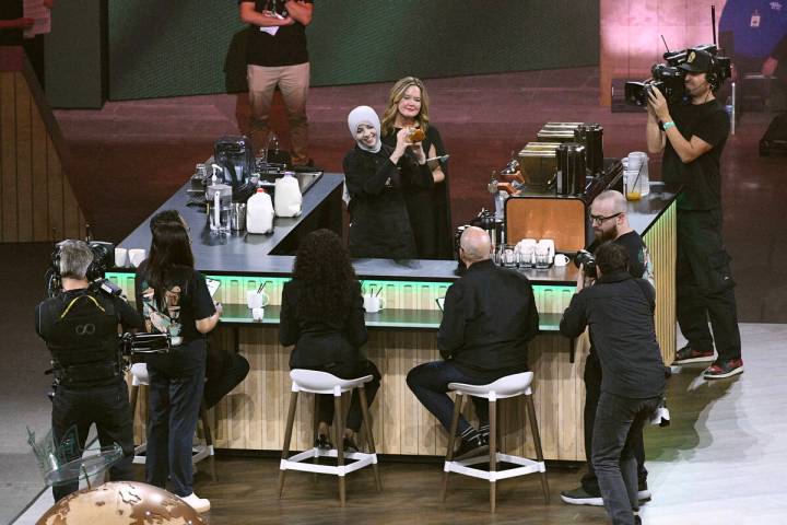 Sumayyah Eid from Jordan competes in a barista competition during the Starbucks Leadership Expe ...