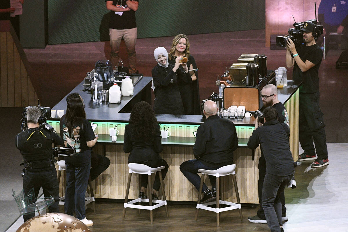 Sumayyah Eid from Jordan competes in a barista competition during the Starbucks Leadership Expe ...