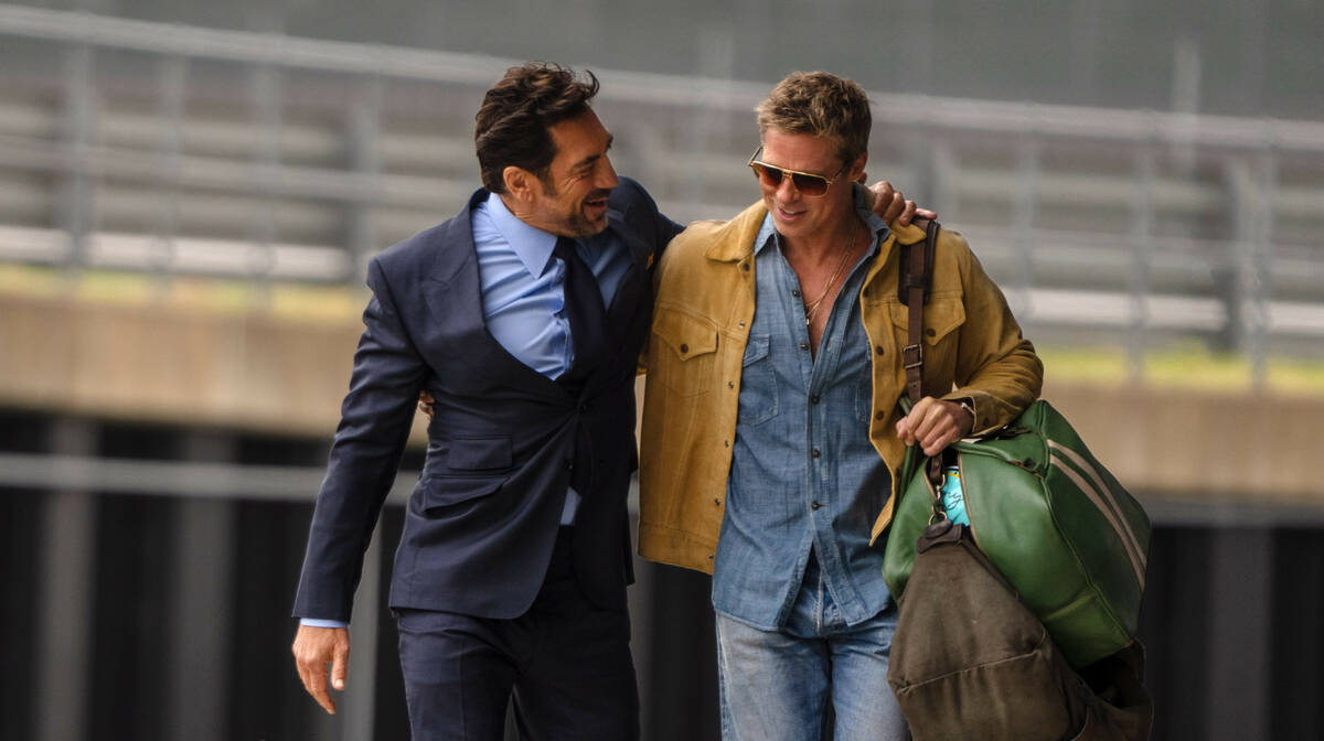 Javier Bardem as Ruben Cervantes and Brad Pitt as Sonny Hayes in Apple Original Films’ “F1 ...