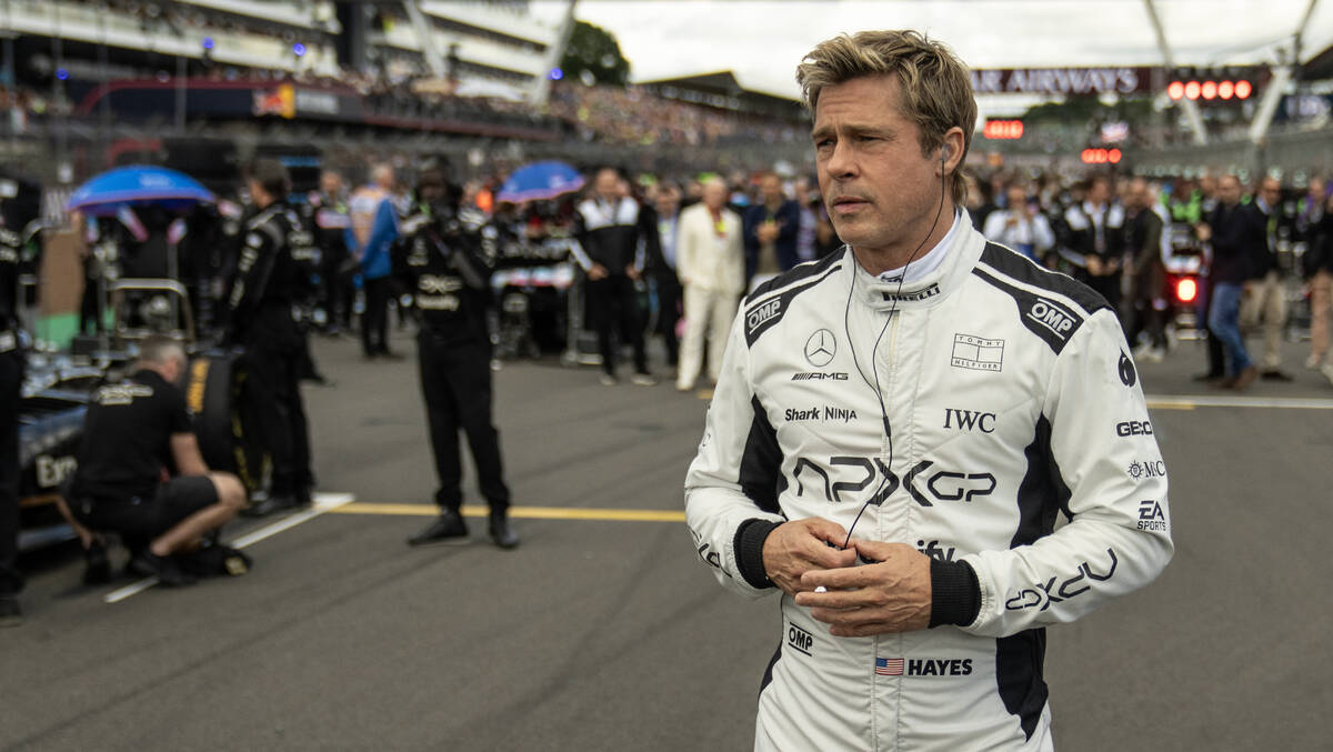 Brad Pitt as Sonny Hayes in Apple Original Films’ “F1® The Movie,” a Warner Bros. Pictur ...