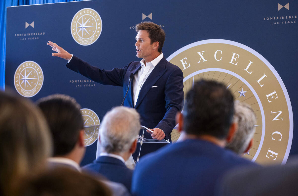Tom Brady speaks about his NFL career in football during the Hall of Excellence Press Conferenc ...