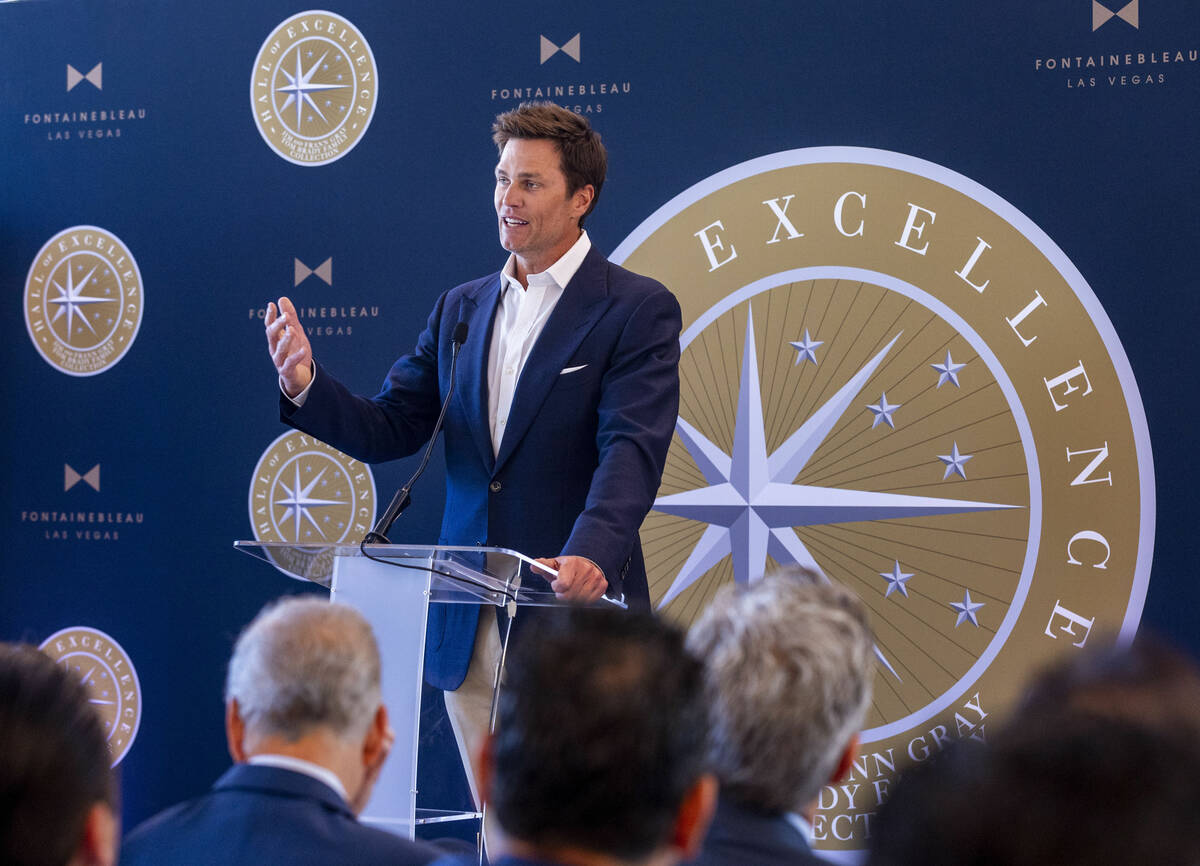 Tom Brady speaks about his NFL career in football during the Hall of Excellence Press Conferenc ...