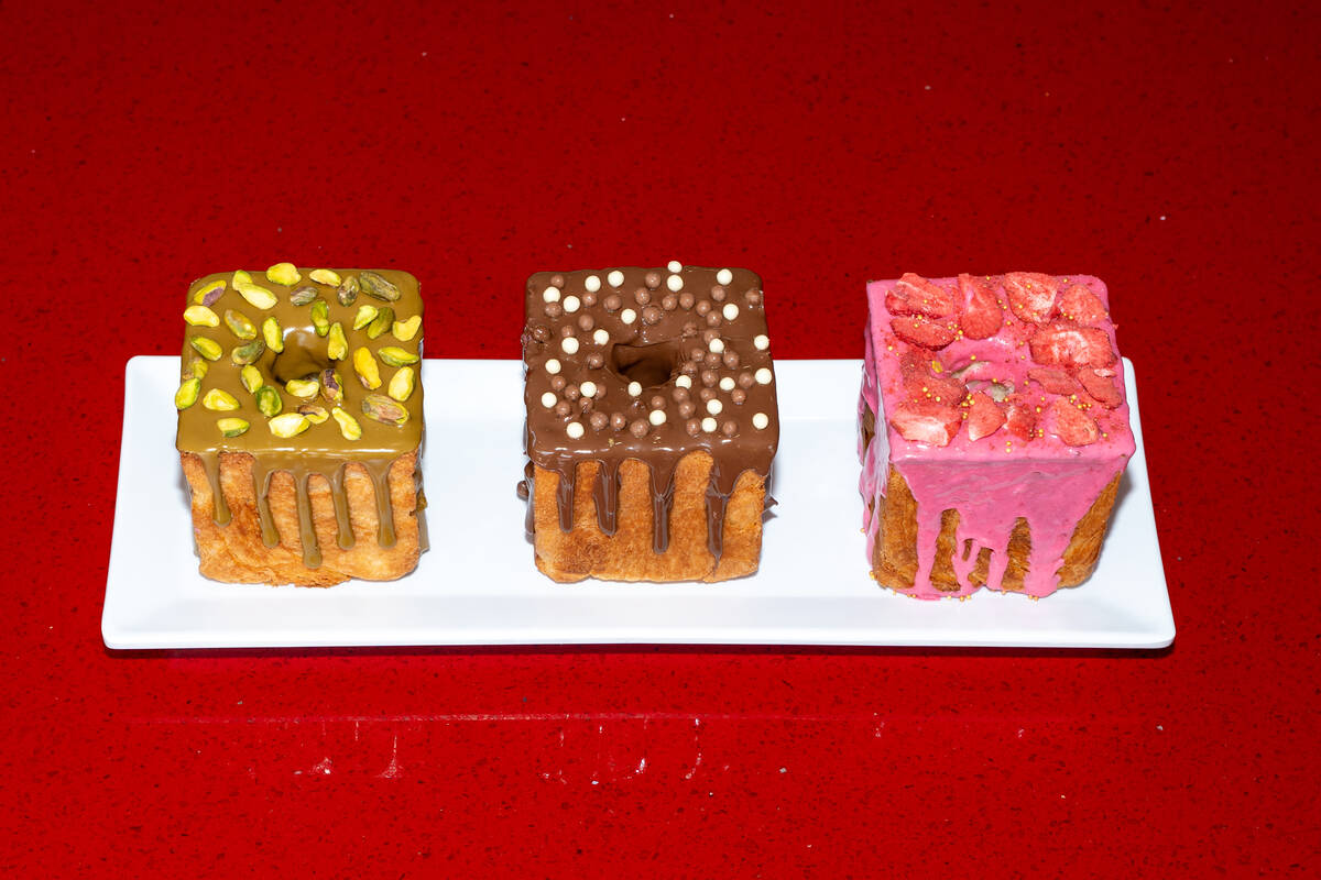 Pistachio, chocolate and strawberry variations of Wicked Donuts’ new cube-shaped doughnu ...