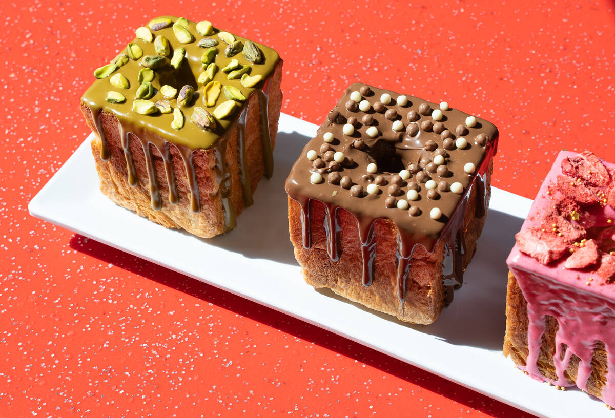 Pistachio, chocolate and strawberry variations of Wicked Donuts’ new cube-shaped doughnu ...