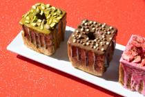 Pistachio, chocolate and strawberry variations of Wicked Donuts’ new cube-shaped doughnu ...