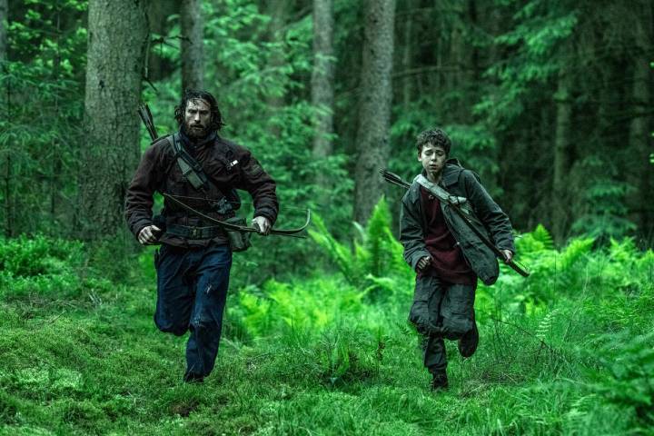 Aaron Taylor-Johnson (left) and Alfie Williams in Columbia Pictures' "28 Years Later.&quot ...