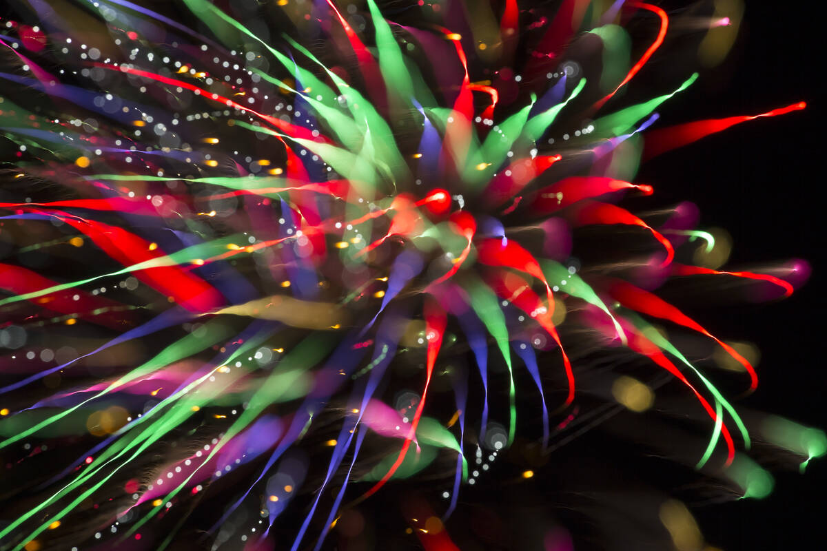 In this July 4, 2018, file photo, fireworks explode from a launchpad behind the Moapa Paiute Tr ...