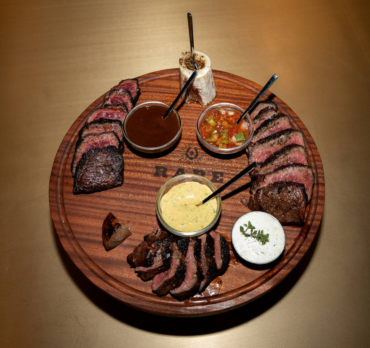 An Associate Board from Rare Society, a live-fire steakhouse set to open July 2, 2025, in the U ...