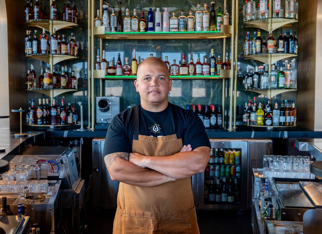 Chef-owner Brad Wise stands in the bar of his restaurant, Rare Society, a live-fire steakhouse ...