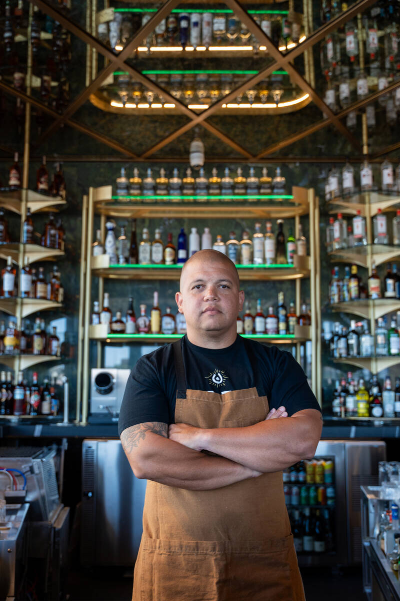 Chef-owner Brad Wise stands in the bar of his restaurant, Rare Society, a live-fire steakhouse ...