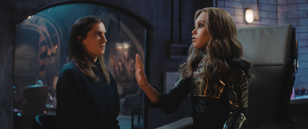 Allison Williams, left, as Gemma and M3GAN in "M3GAN 2.0," directed by Gerard Johnsto ...