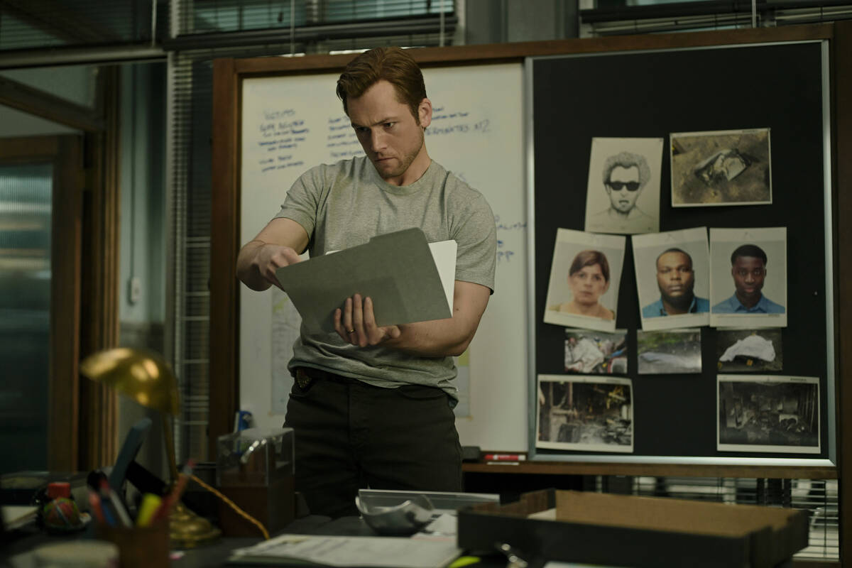 This image released by Apple TV+ shows Taron Egerton in a scene from "Smoke." (Apple ...