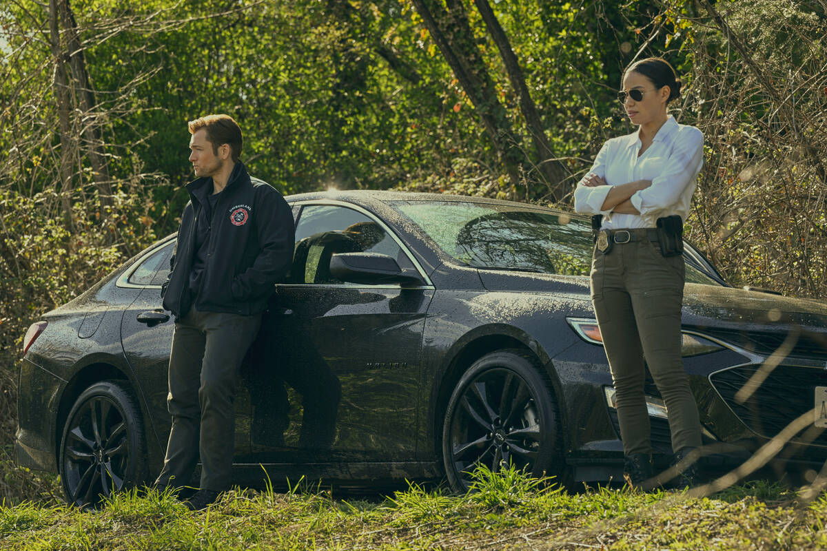 This image released by Apple TV+ shows Taron Egerton, left, and Jurnee Smollett in a scene from ...