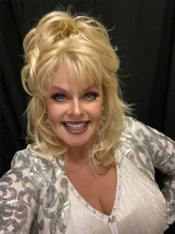 Vegas vocalist Kelly Vohnn is shown as Dolly Parton. The Las Vegas artist portrays Parton, Reba ...