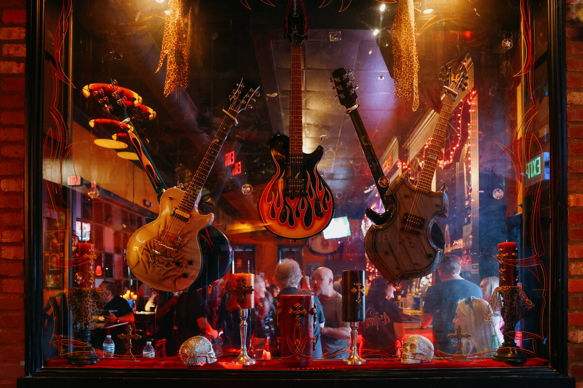 Guitars in glass cases decorate Count's Vamp'd Rock Bar & Grill during the bar’s las ...