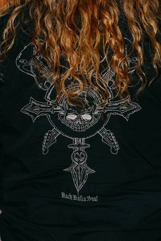 A patron wears a rock-themed shirt at Count's Vamp'd Rock Bar & Grill on Saturday, June 28, ...