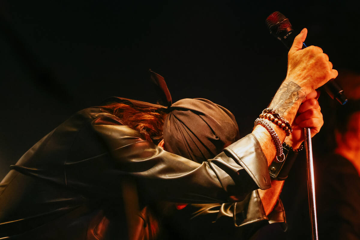 Danny “The Count” Koker takes an emotional moment onstage as he performs with his ...