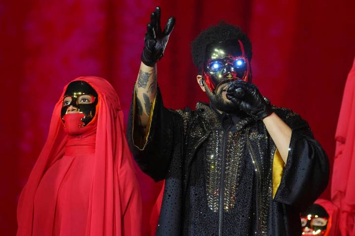 The Weeknd, right, performs on Wednesday, June 25, 2025, at SoFi Stadium in Inglewood, Calif. ( ...