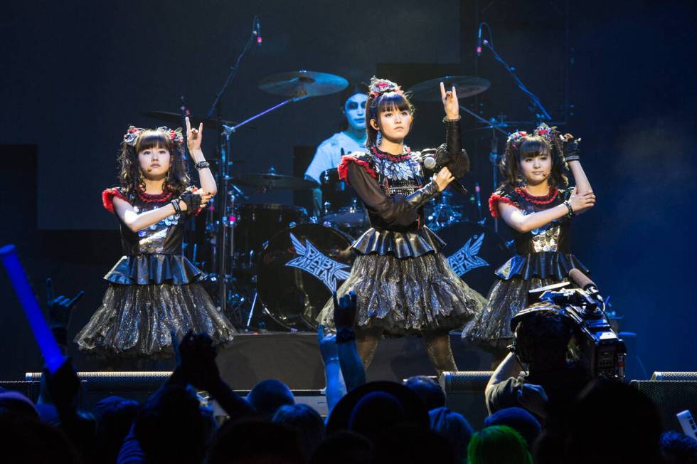 Yui Mizuno, from left, Suzuka Nakamoto, and Moa Kikuchi of BABYMETAL perform at the 2016 Journe ...