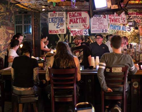 Customers crowd the bar area of the Double Down Saloon, located at 4640 Paradise Road in Las Ve ...