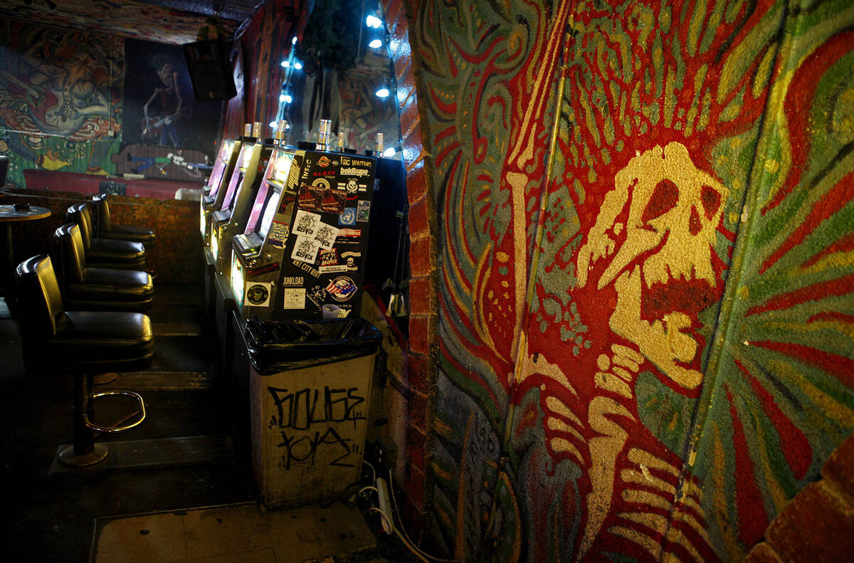 The Double Down Saloon's eclectic decor surrounds the bar's pool tables, stage for bands and se ...