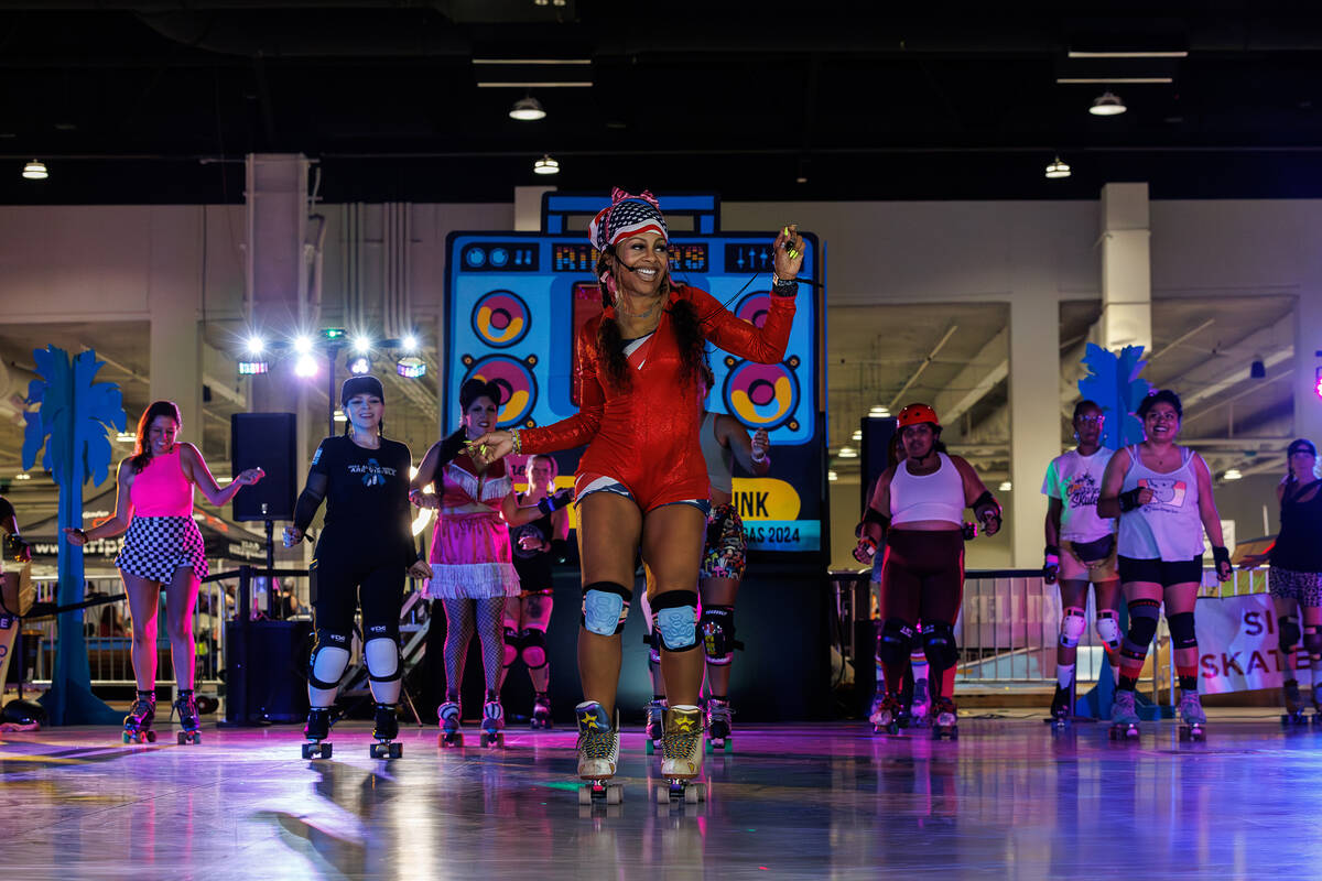 An instructor leads a skating session on the dance rink at RollerCon. (Jenni Webber/RollerCon)