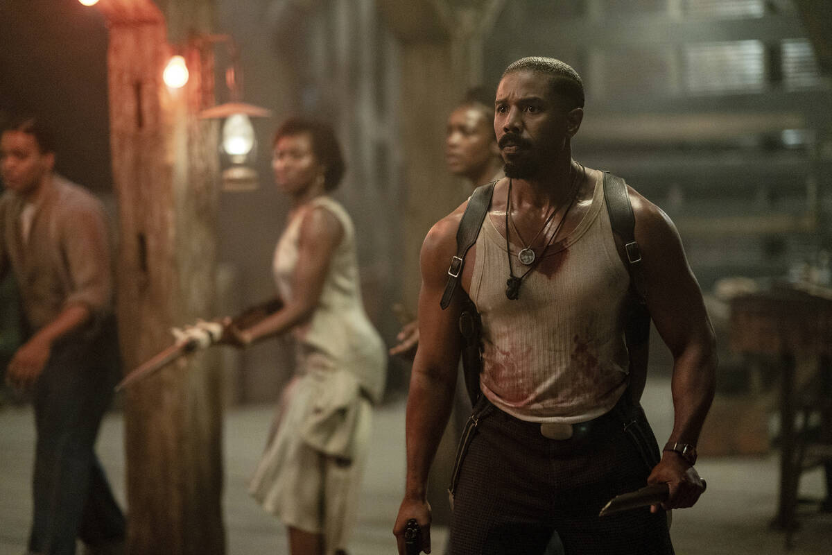 This image released by Warner Bros Pictures shows Michael B. Jordan, right, in a scene from &qu ...