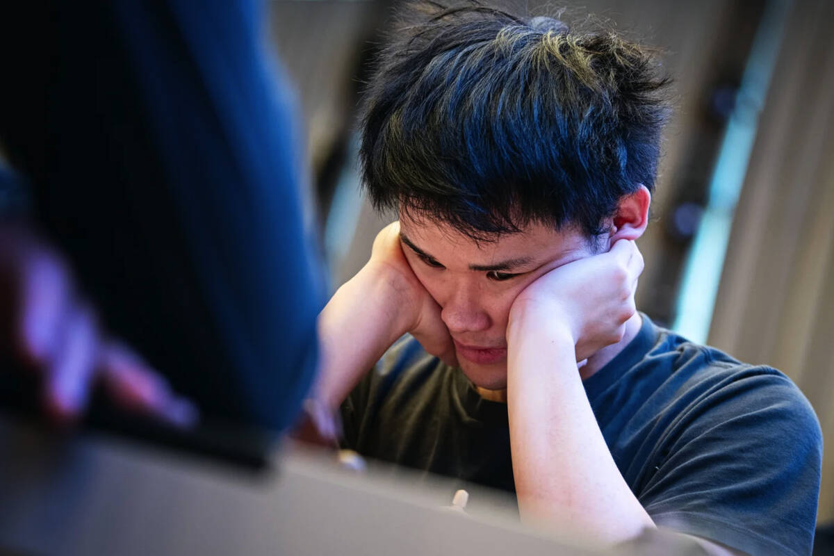 American chess master Awonder Liang watches as his opponent makes a move during a match in Apri ...