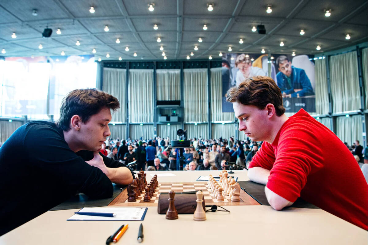 Chess masterss Vincent Keymar, left, and Andrey Esipenko square off in a match the Grenke Frees ...