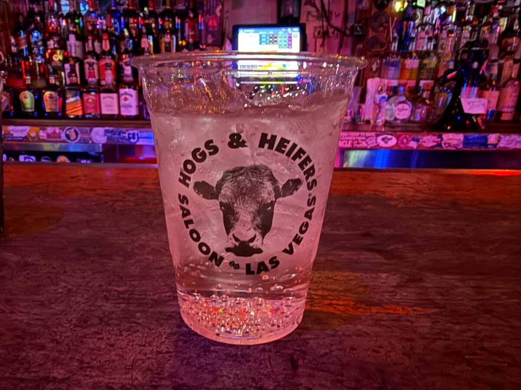 A soda water with the Hogs & Heifers Saloon logo is shown on Monday, May 12, 2025. (John Katsil ...