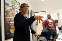 Filmmaker and former professional basketball player Deon Taylor, left, discusses the movie indu ...