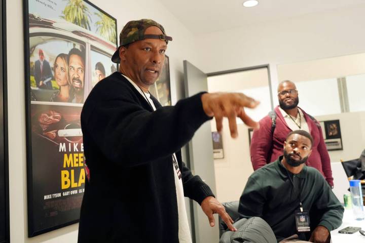 Filmmaker and former professional basketball player Deon Taylor, left, discusses the movie indu ...