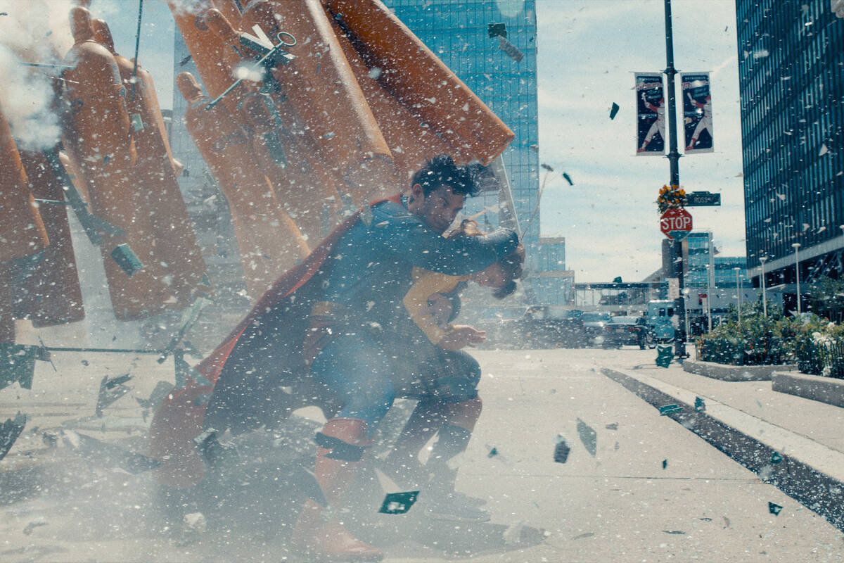 David Corenswet’s Man of Steel has his hands full in a scene from “Superman&#x201 ...