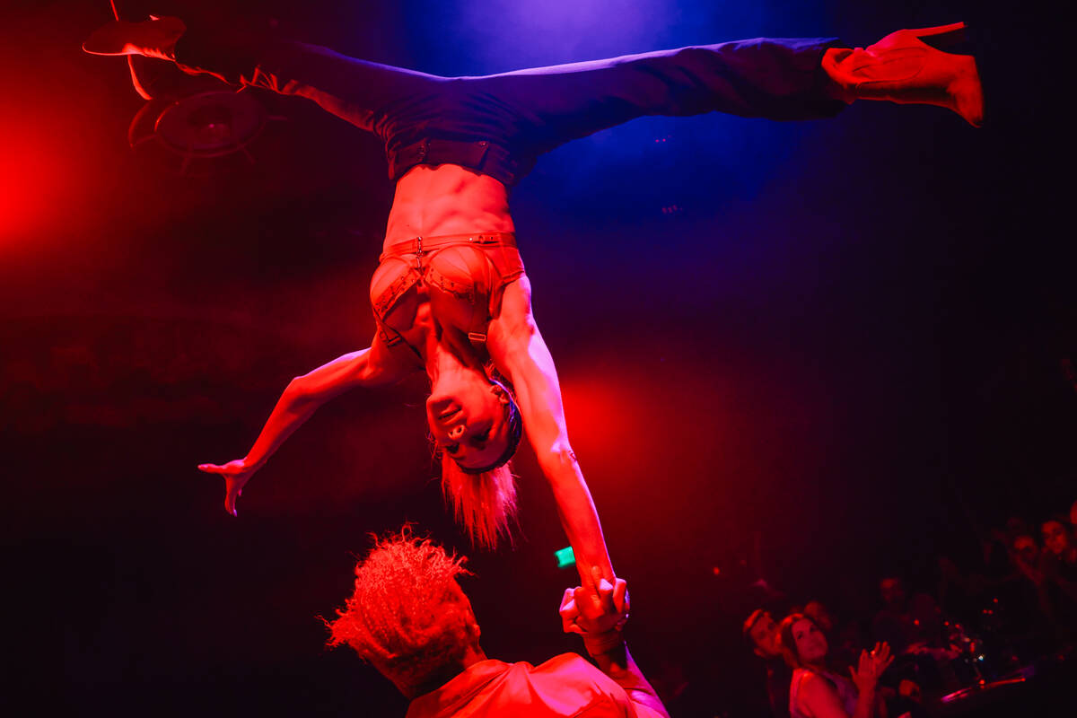 A duo performs during The Party at Superfrico inside of the Cosmopolitan Sunday, July 13, 2025, ...