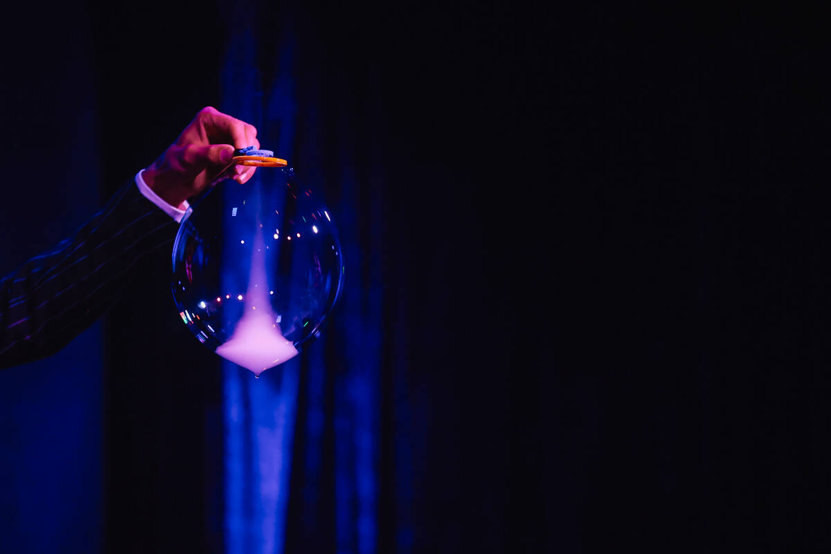 A performer makes bubbles during The Party at Superfrico inside of the Cosmopolitan Sunday, Jul ...