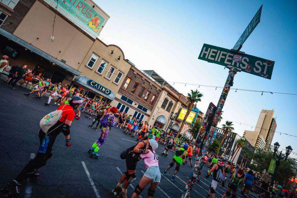 Roller skaters skate outside the Downtown Grand during RollerCon Wednesday, July 9, 2025, in La ...