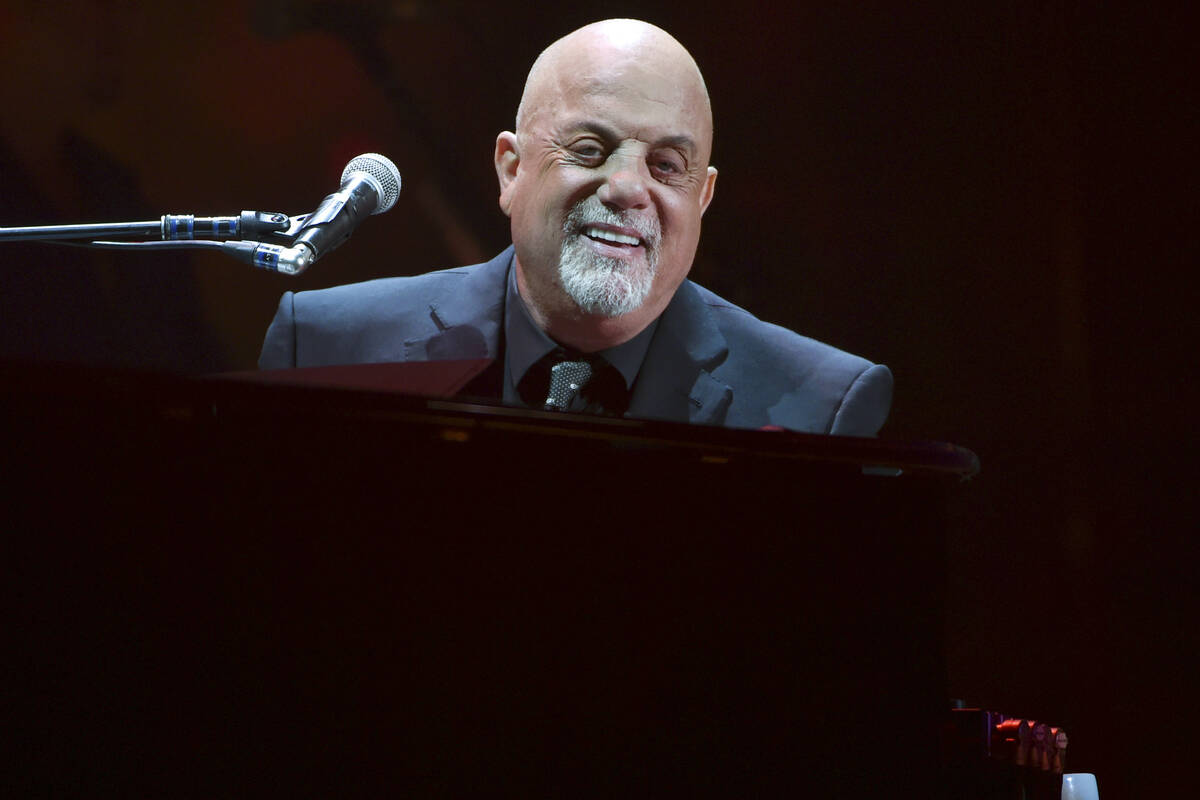 Musician Billy Joel performs during his 100th lifetime performance at Madison Square Garden on ...