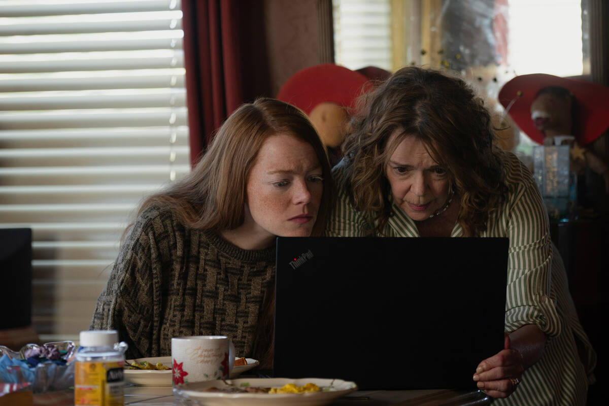Emma Stone, left, and Deirdre O’Connell in a scene from "Eddington." (Richard ...