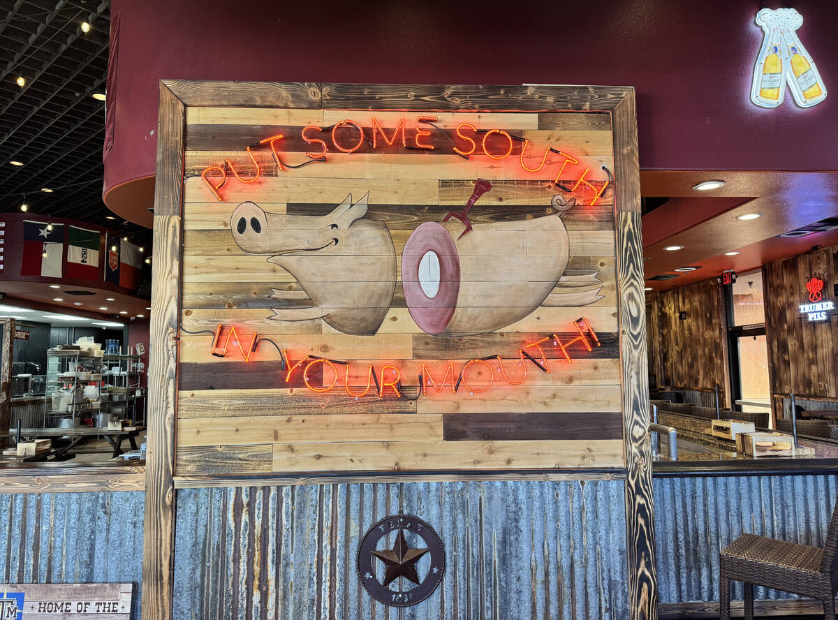 A humorous decorative sign at Big B's Texas BBQ, set to open during the third week of July 2025 ...