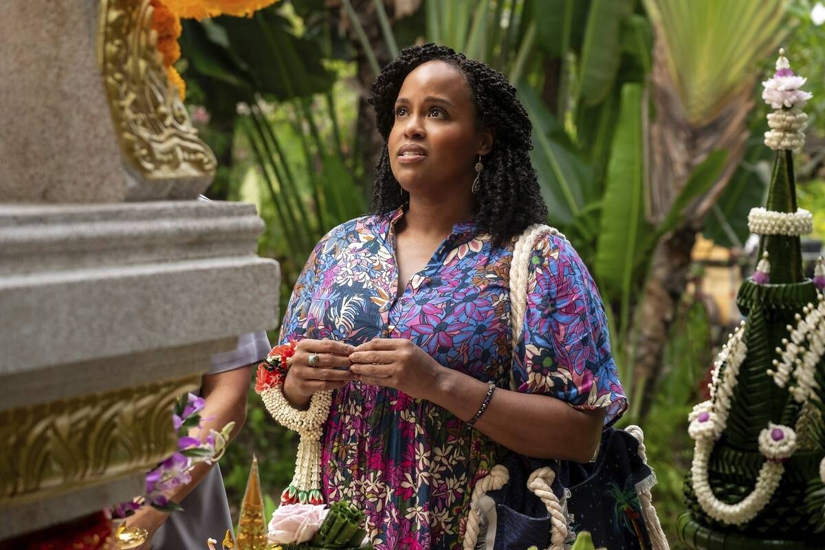 This image released by HBO shows Natasha Rothwell in a scene from "The White Lotus." ...
