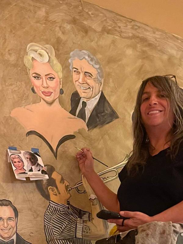 Las Vegas artist Erica Deutsch is shown with her portrait of Lady Gaga and Tony Bennett at Palm ...