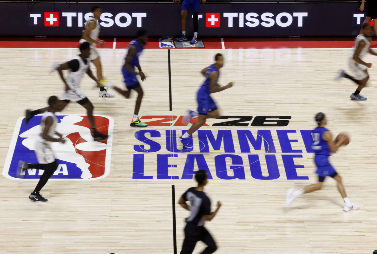 Dallas Mavericks guard Ryan Nembhard dribbles up the court during the third day of the NBA Summ ...