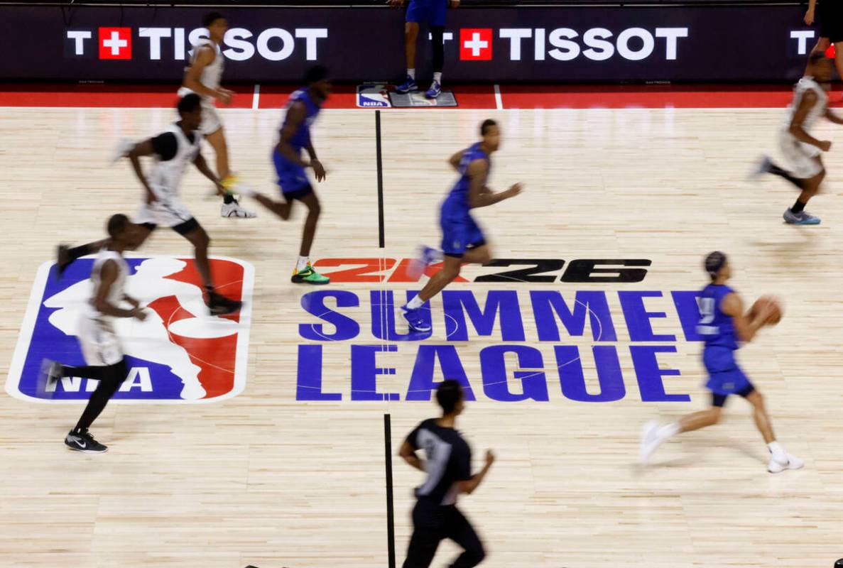 Dallas Mavericks guard Ryan Nembhard dribbles up the court during the third day of the NBA Summ ...