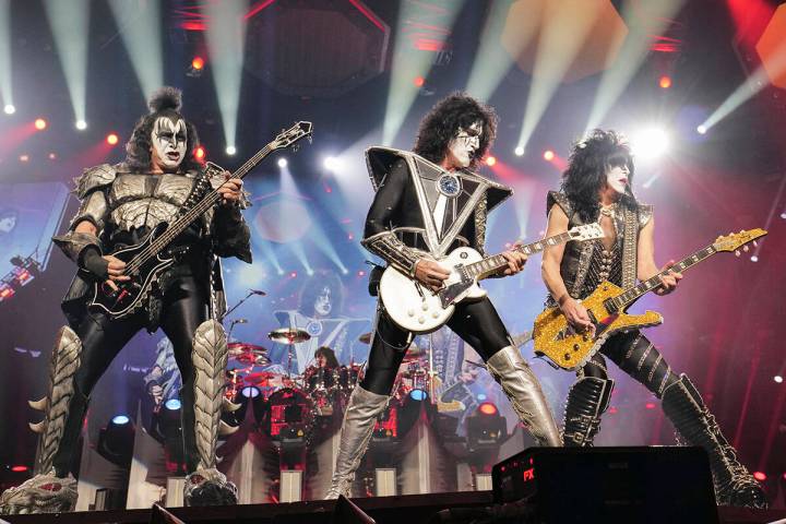 Gene Simmons, left, Tommy Thayer, Paul Stanley of KISS perform during the final night of the &q ...