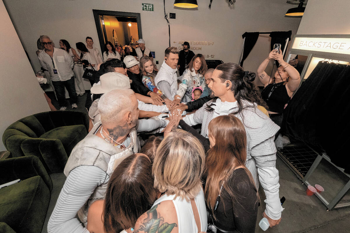 Sphere Entertainment The Backstreet Boys huddle up backstage before an opening weekend performa ...
