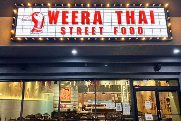 The exterior of Street Food by Weera Thai glows on West Sahara Avenue in Las Vegas. (Street Foo ...